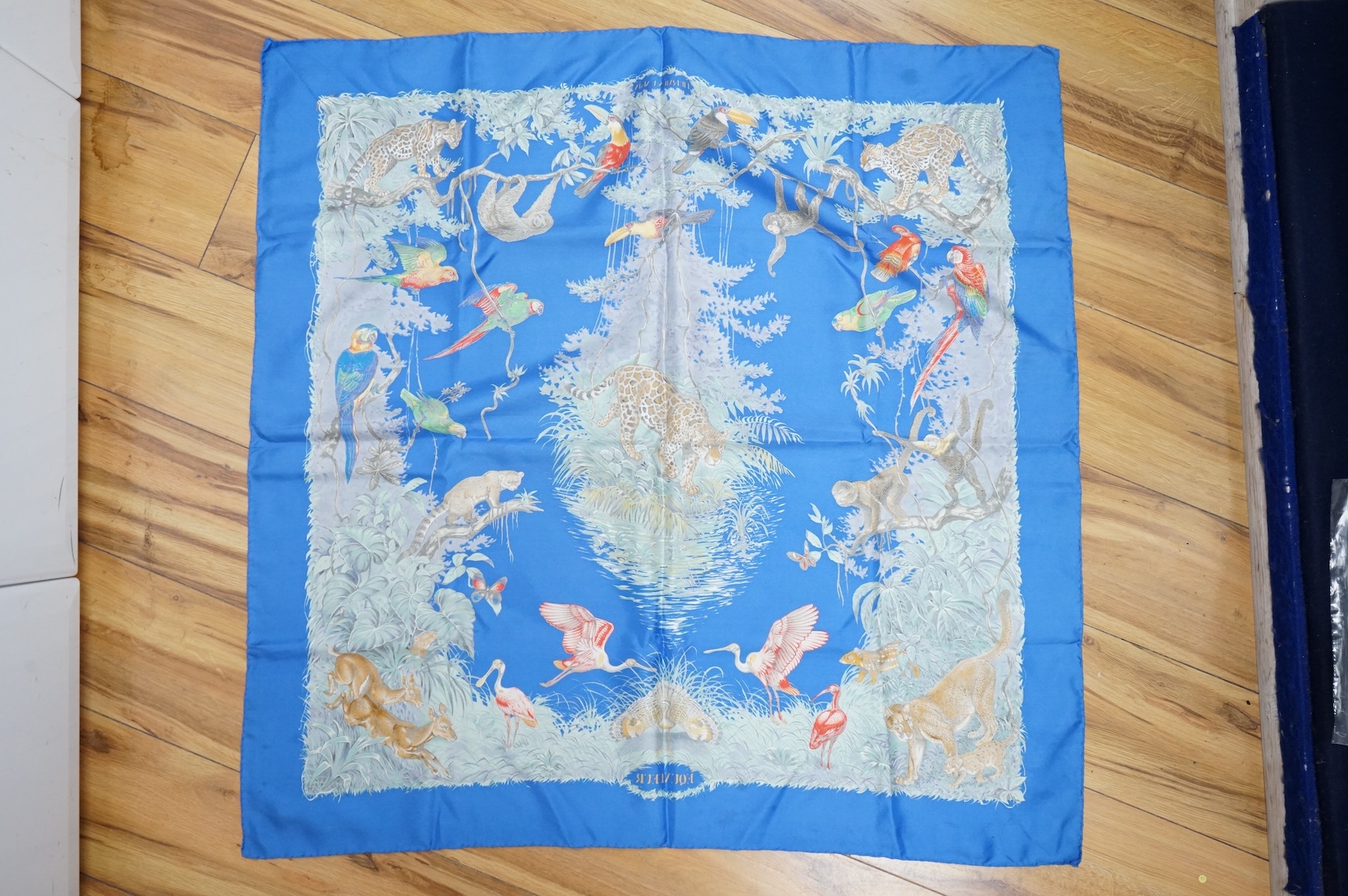 Two boxed Hermes silk scarves comprising ‘Real Escuela Andaluza del Arte Equestre’ and ‘Equateur’, with original boxes, together with four Hermes gentleman’s silk ties